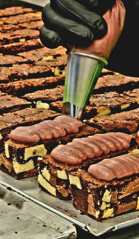 Browniebar Original met een Frambozen-ganache omhuld met een laag melkchocola